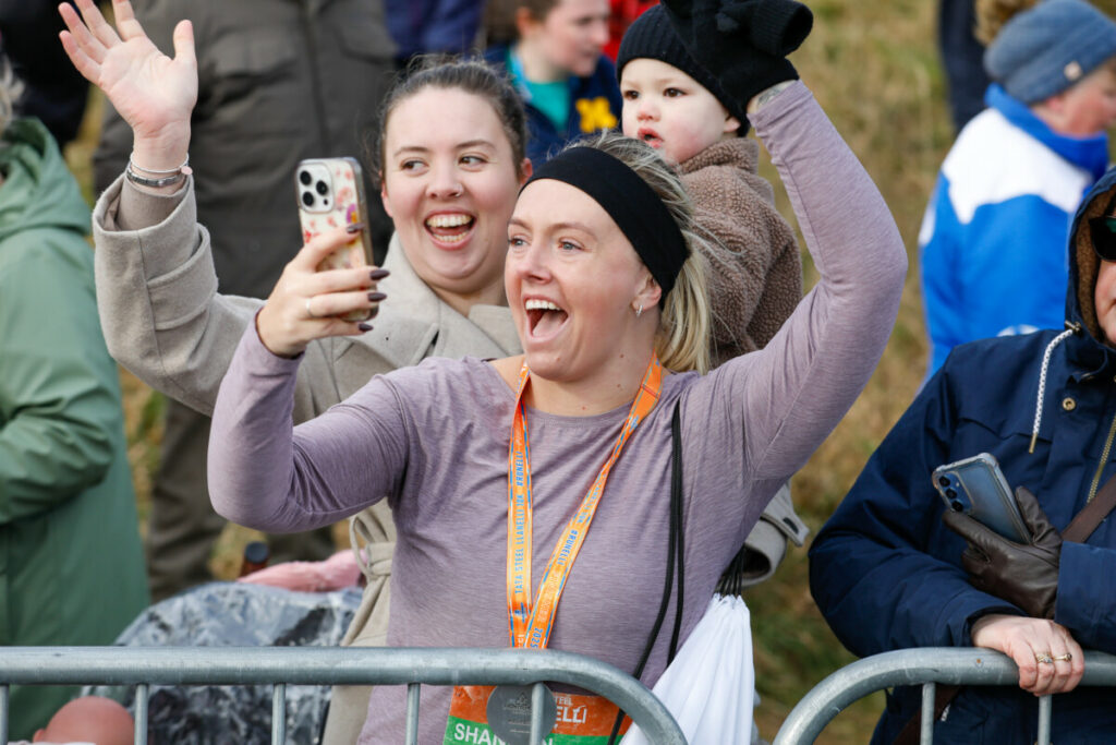 Cheering crowd at the finish line of the Llanelli 10K and Half Marathon