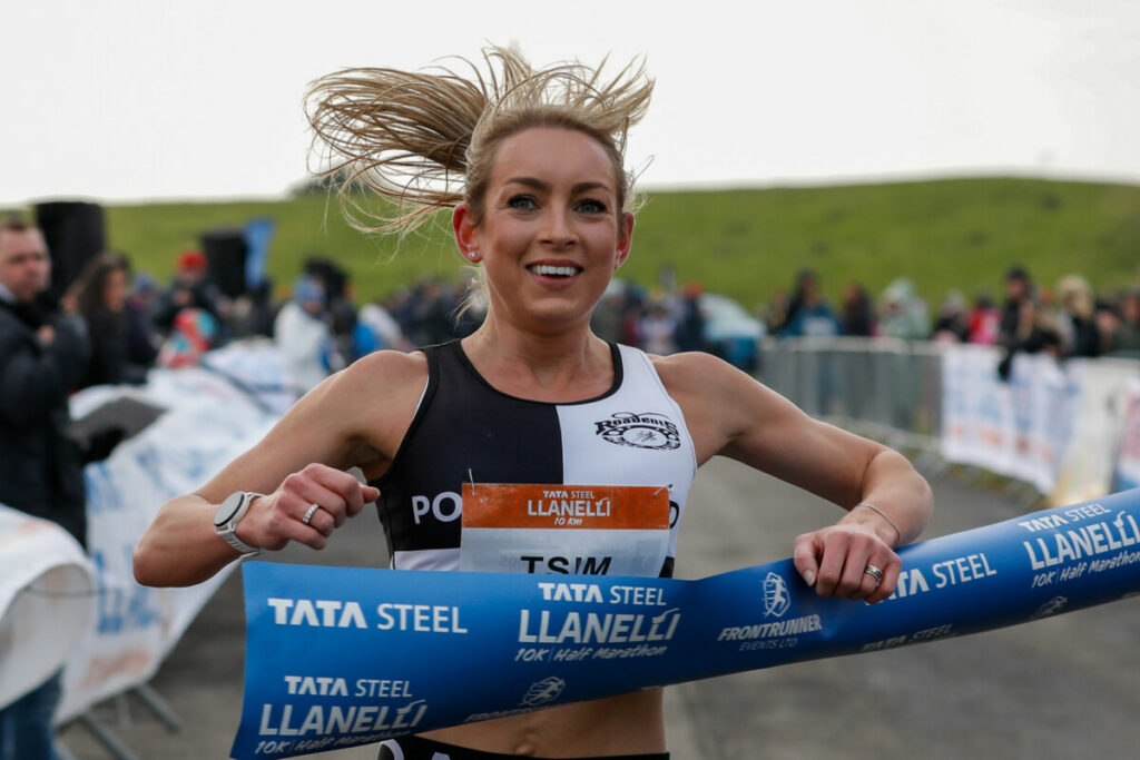 Olivia Tsim taking first place at the Llanelli 10K